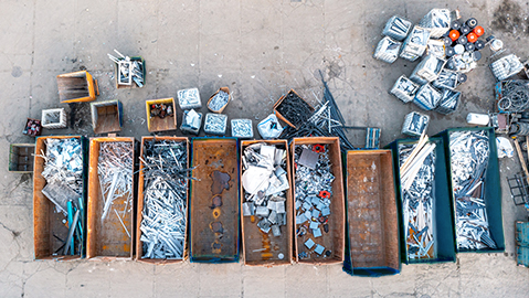 Row of Dumpsters Sorted by Waste Type