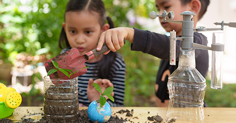 Two Children Making a Planter