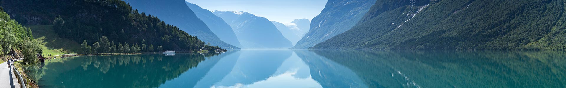 River Sitting Between Two Mountainscapes