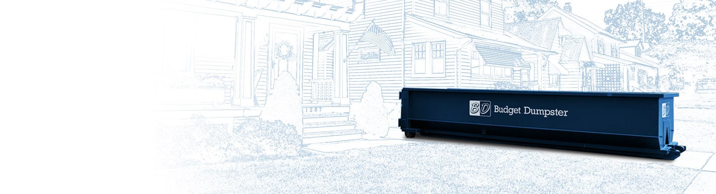 Roll Off Dumpster in Driveway of Residential House.