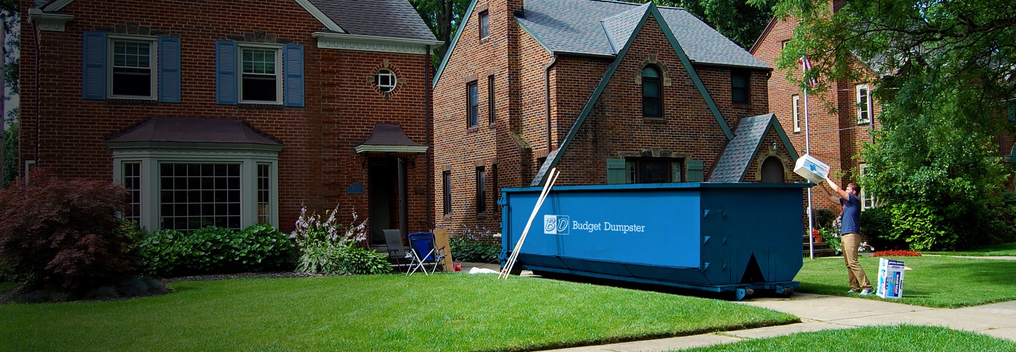 Blue Roll Off Dumpster in Residential Neighborhood