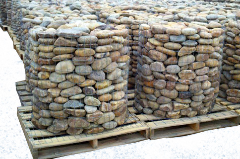 Piles of Landscape Rocks on Pallets on Blueprint Background