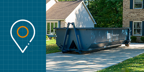 Dumpster in Driveway Next to Location Icon