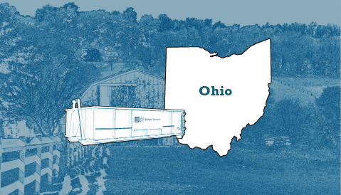 Outline of the State of Ohio and a Budget Dumpster Over a Photograph of a Covered Bridge